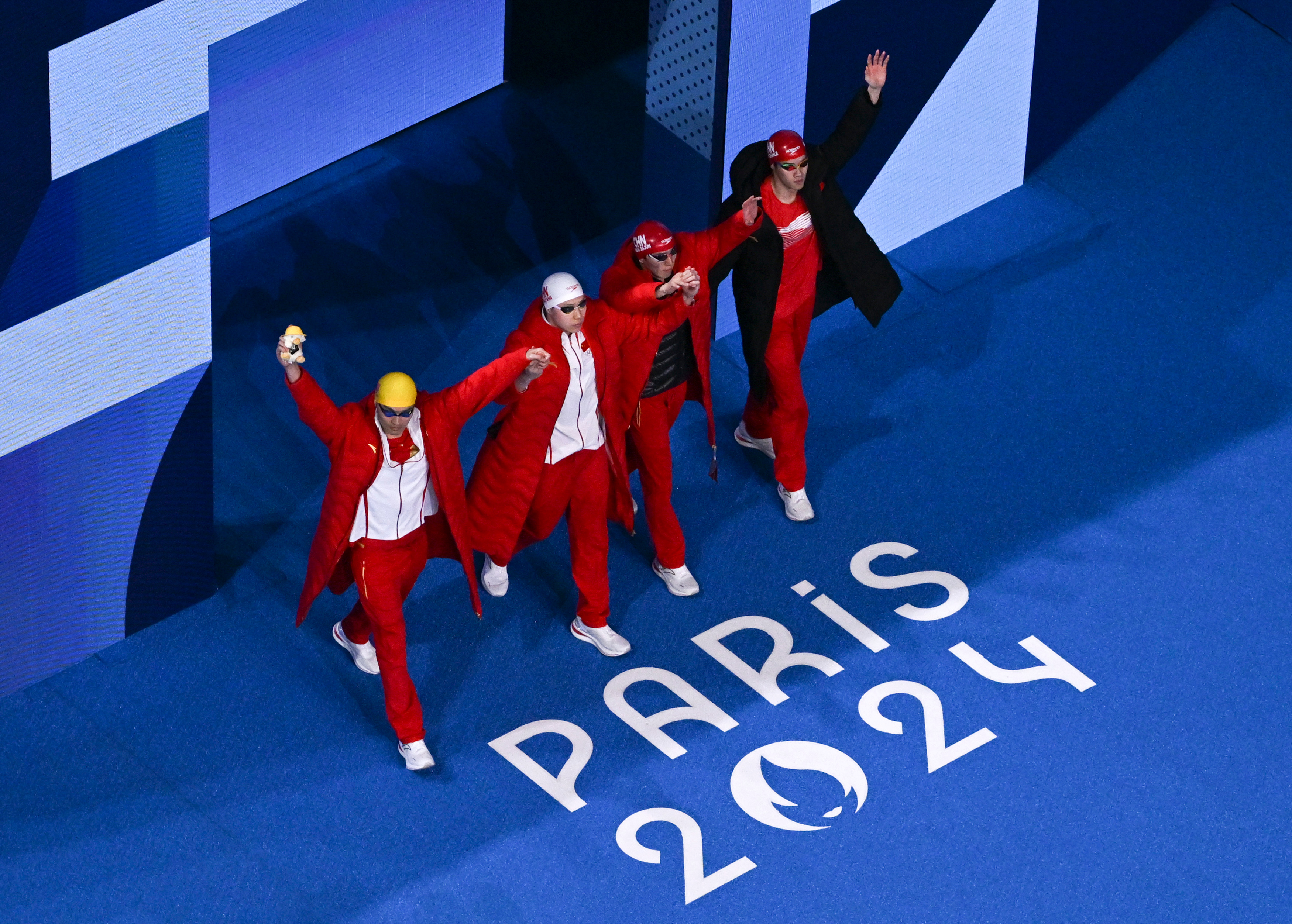 半岛综合体育官方app下载-关于游泳男子接力赛场刺激，选手象征团结的信息